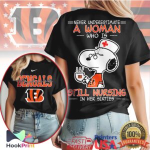 Cincinnati Bengals Snoopy Nurse Never Underestimate A Woman Still Nursing In Her Sixties T Shirt